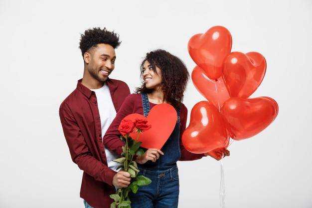 young attractive african american couple dating with red rose heart balloon 1258 2727