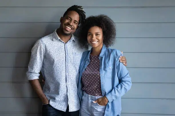 Equality In Marital Relationship Is Never 50/50 5 husband-and-wife-holding-each-other-and-smiling