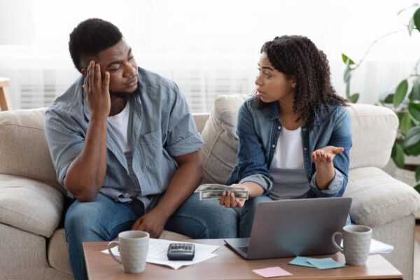 young-couple-discussing-money-in-their-relationship